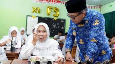 Pj Gubernur Lampung Tinjau Program Makan Bergizi Gratis di Sekolah, Dukung Generasi Sehat dan Cerdas