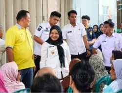 Wali Kota Bandar Lampung, Eva Dwiana Menghadiri Kegiatan Penyerahan Bantuan Beras yang di Selenggarakan Oleh Han Yuan Chinese di Bandar Lampung